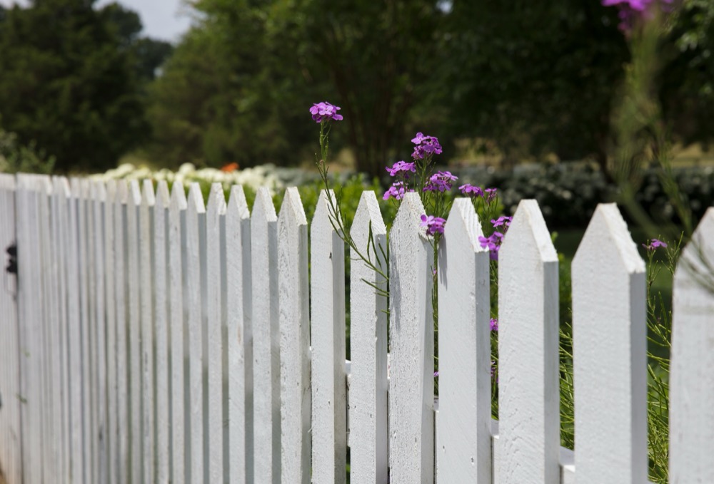 Fencing contractor on phone